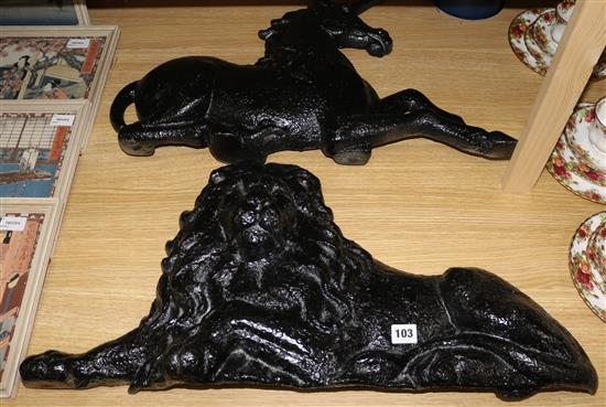 A pair of Victorian cast iron plaques of a lion and unicorn